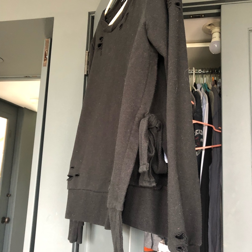Sweat shirt with holes and ties on the side large